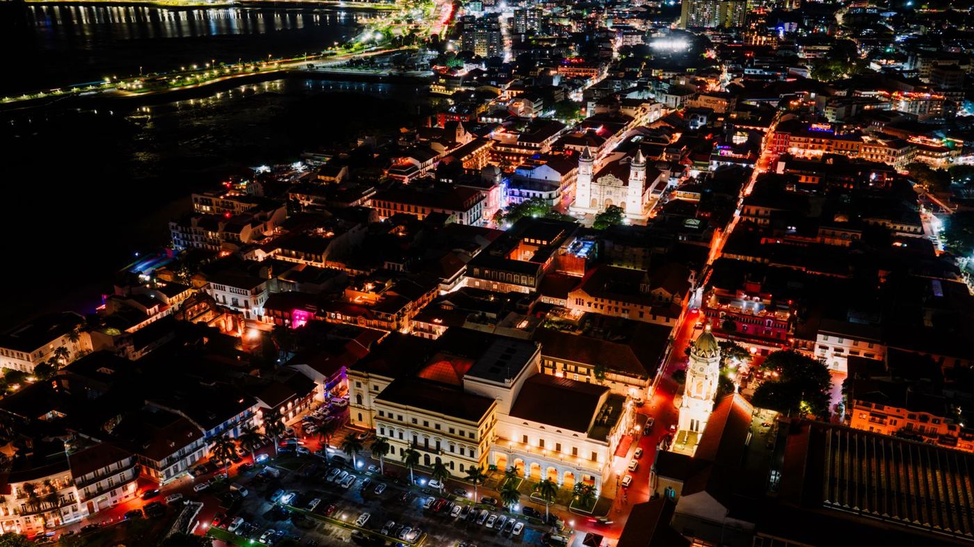 Dense city skyline at night